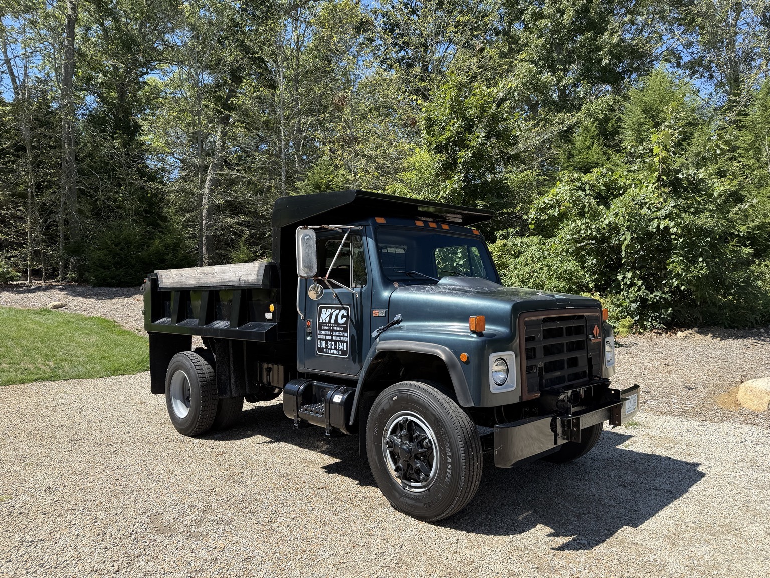 M.T.C. dump truck on a site work project