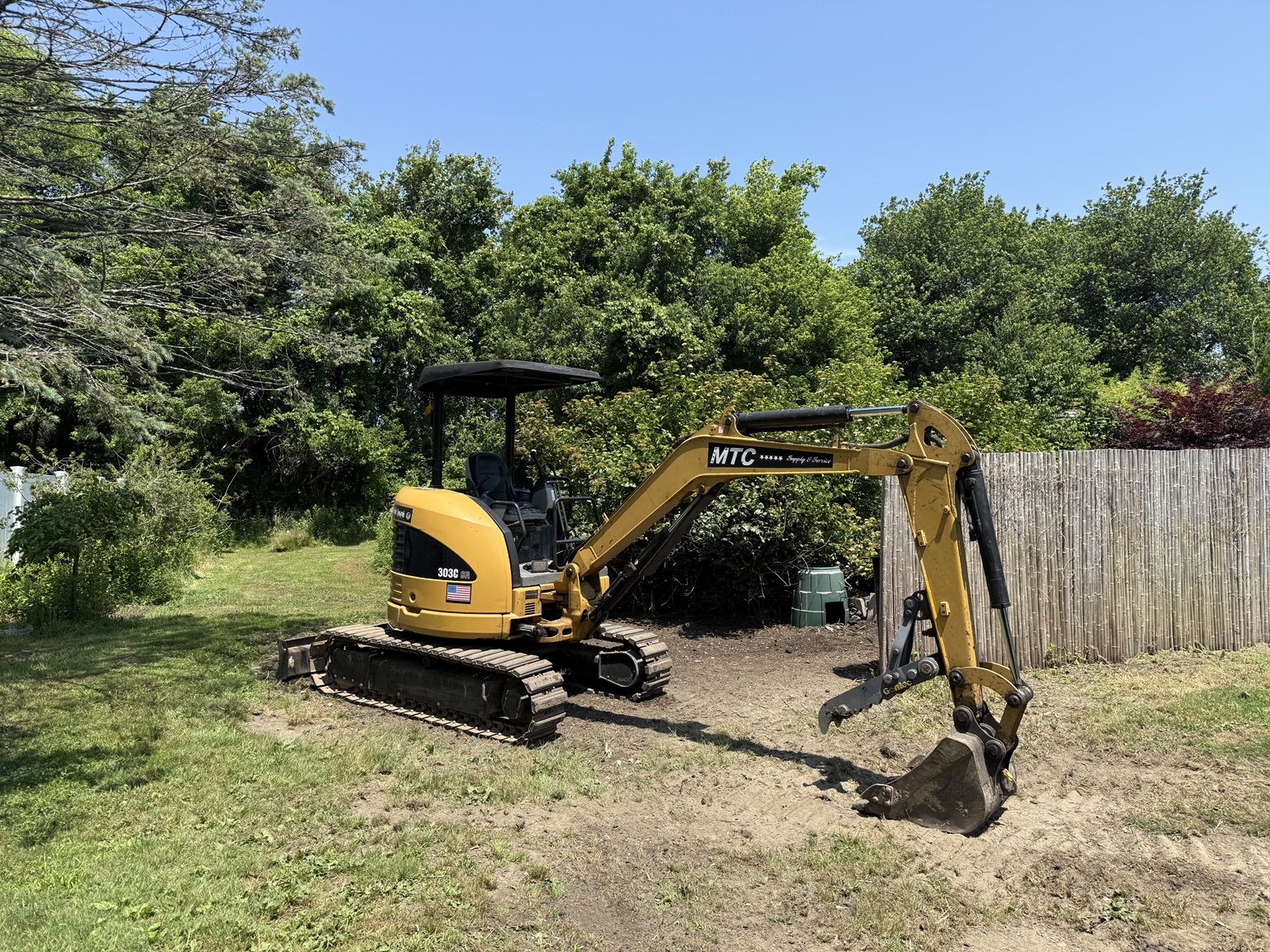 M.T.C. excavator working on a property